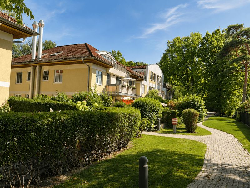 KENSINGTON – Exklusiv – Vermietete Terrassenwohnung mit privatem Gartenbereich und Tiefgaragenplatz